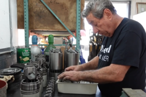 Technician Getting Ready To Overhaul A Detroit Diesel 8V71